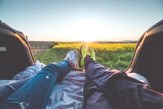 young-couple-enjoying-romantic-sunset-from-car-trunk-picjumbo-com